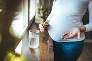 Picture,Of,Pregnant,Woman,Taking,Medication,Pills.,Pregnant,Woman,Taking